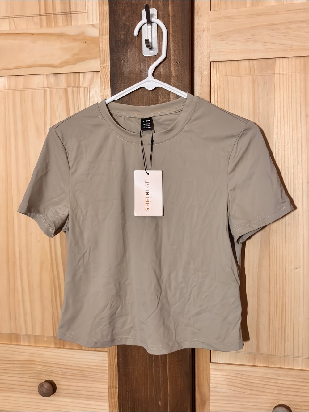 Sleek Material Crew Neck Short Sleeve Crop Tee